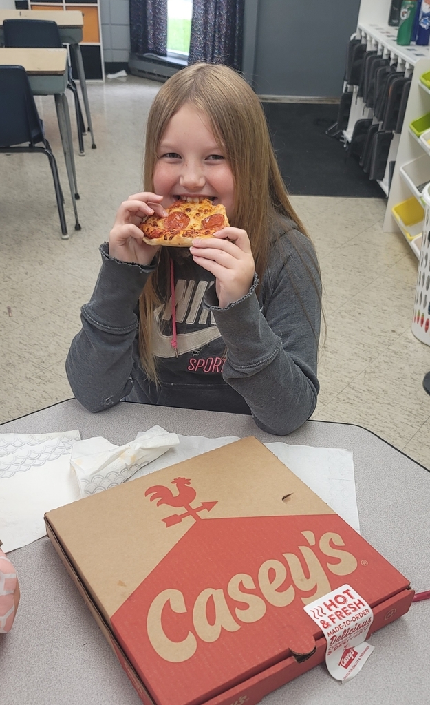 Carlee eating her pizza from Casey's! 